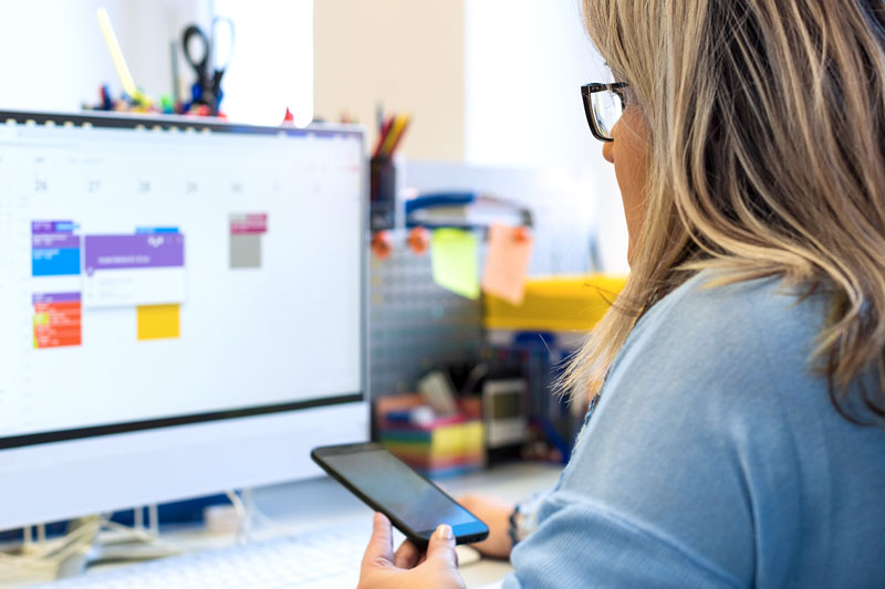 woman looking at calendar