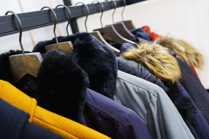 How to Purge Your Closet for the Fall Season 5 Modern outerwear in a shop on a hanger.