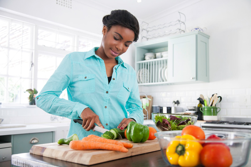 woman cooking in kitchen