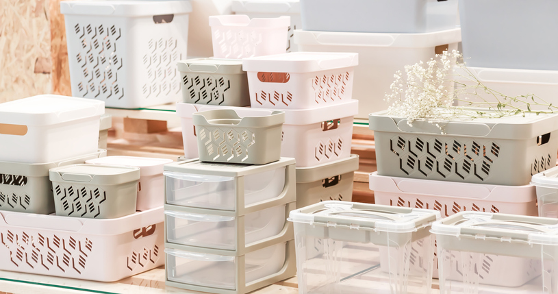 Organization of home space, storage and coziness, a lot of plastic household goods, new clean container boxes with a lid for easy storage of things GettyImages 1280337908