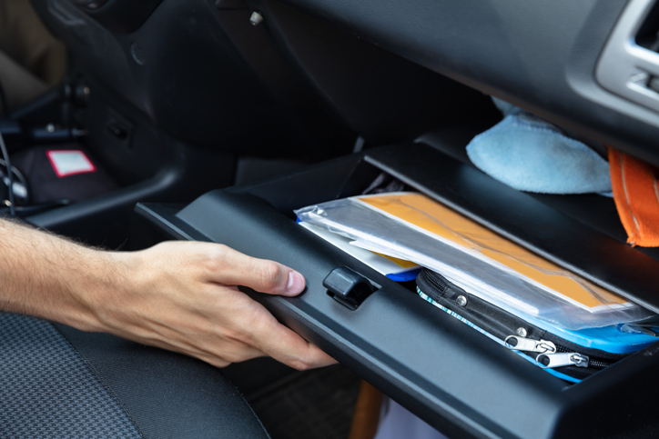 Driver Opening Glovebox Compartment GettyImages 1174295393